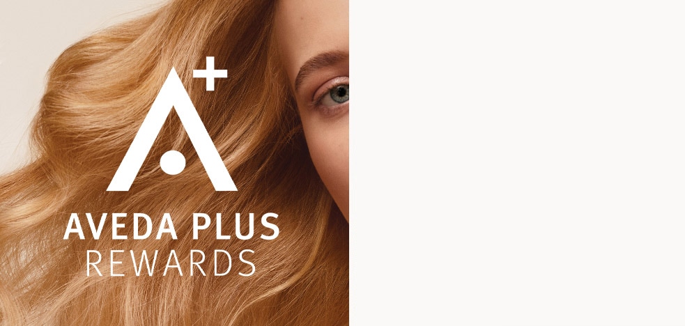 AVEDA PLUS REWARDS logo overlayed on image of Aveda hair care model.