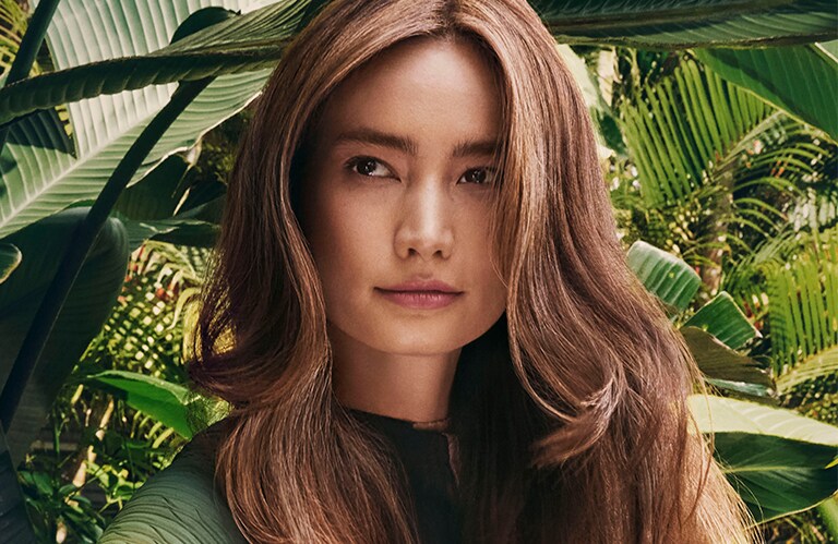 Master imagery of Nutriplenish hair care model.